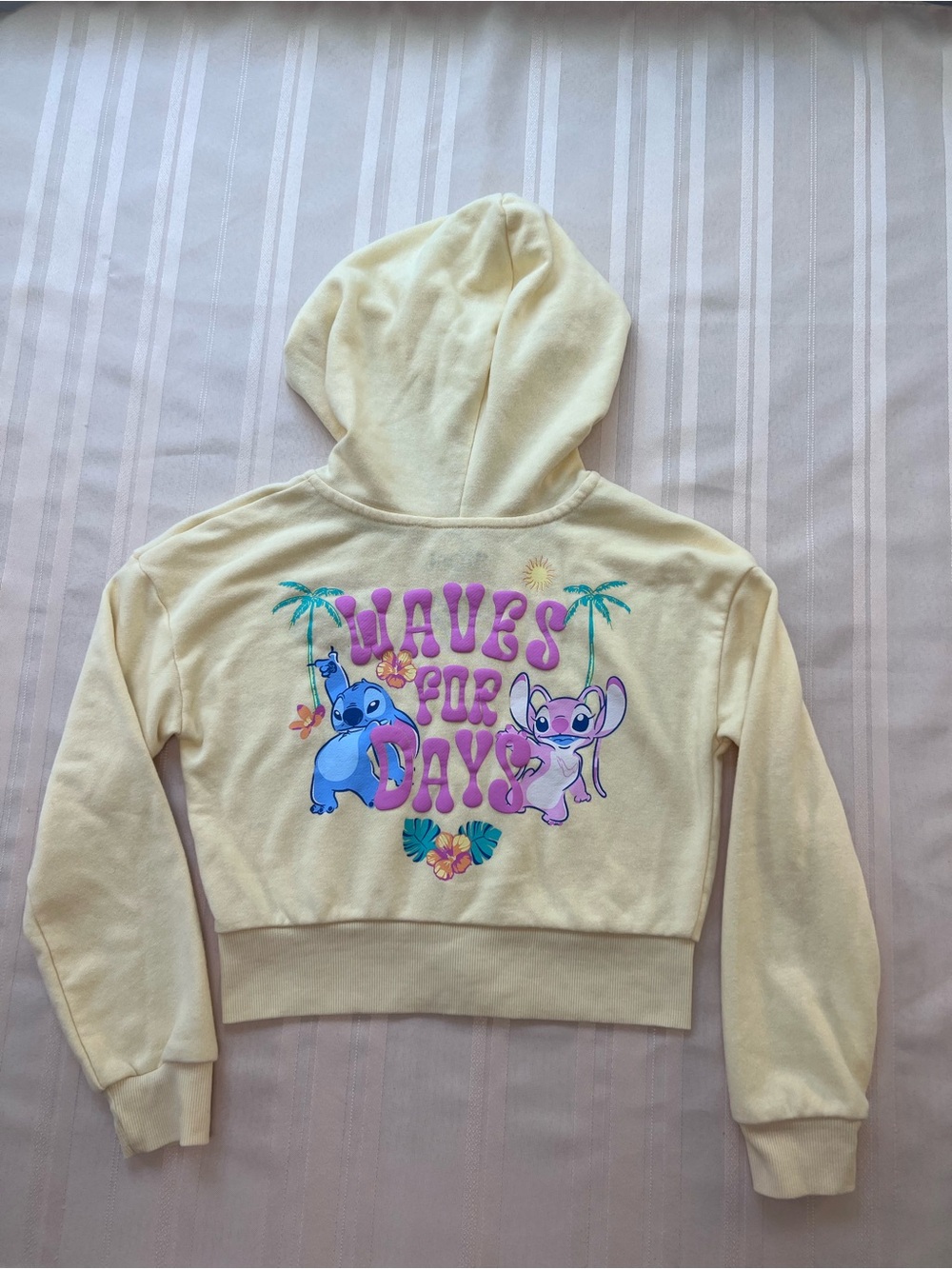 Disney Stitch “Waves for Days” zip up hoodie pale yellow w/front pockets size Ch